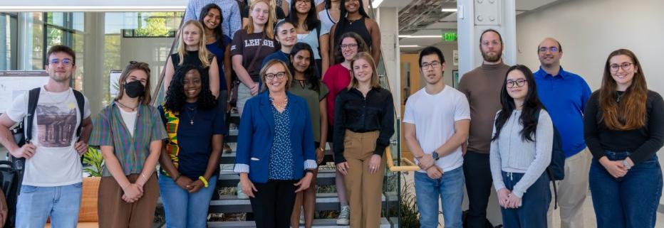 Image of the College of Health, students, faculty, staff on a staircase in the Health, Science & Technology building on Lehigh's campus